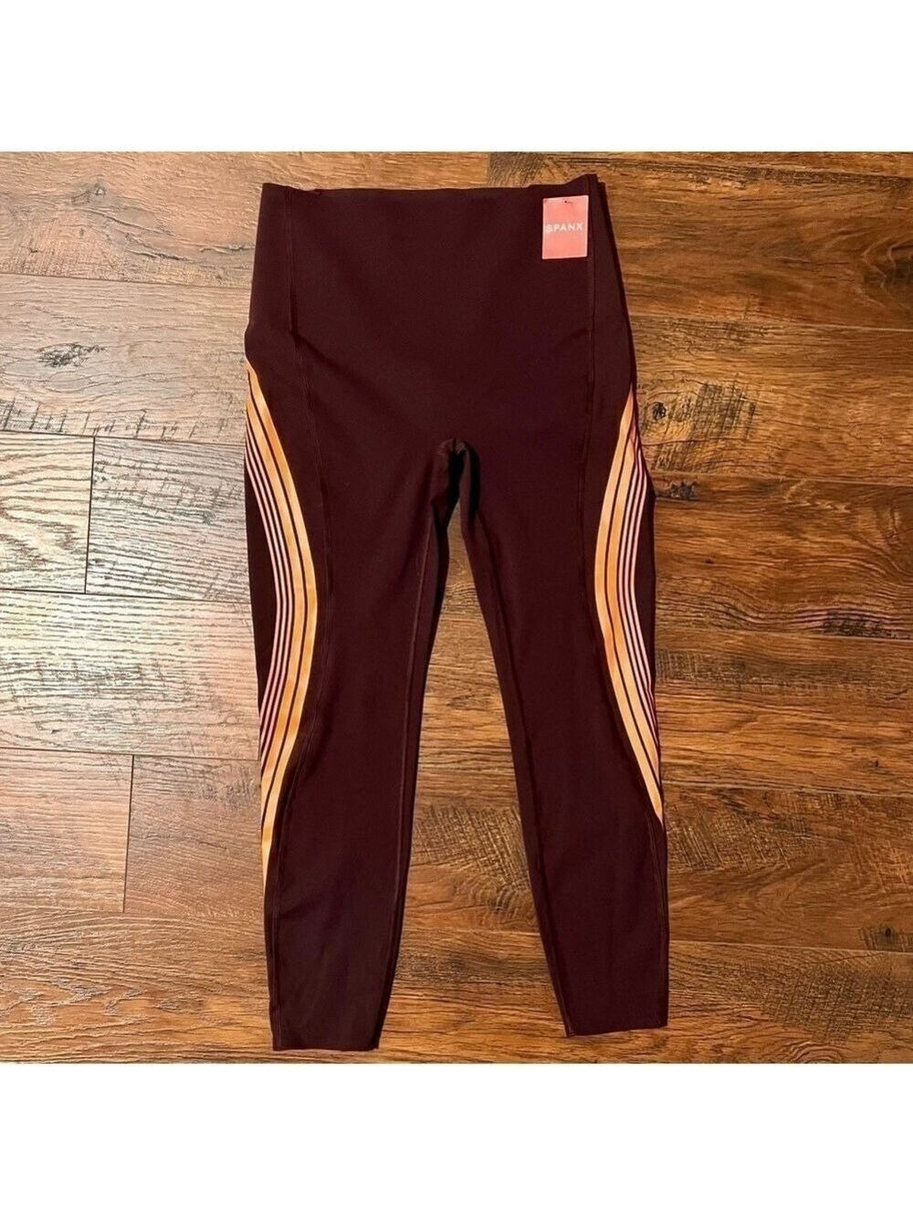 SPANX Contour orange stripe leggings. NWT Size S